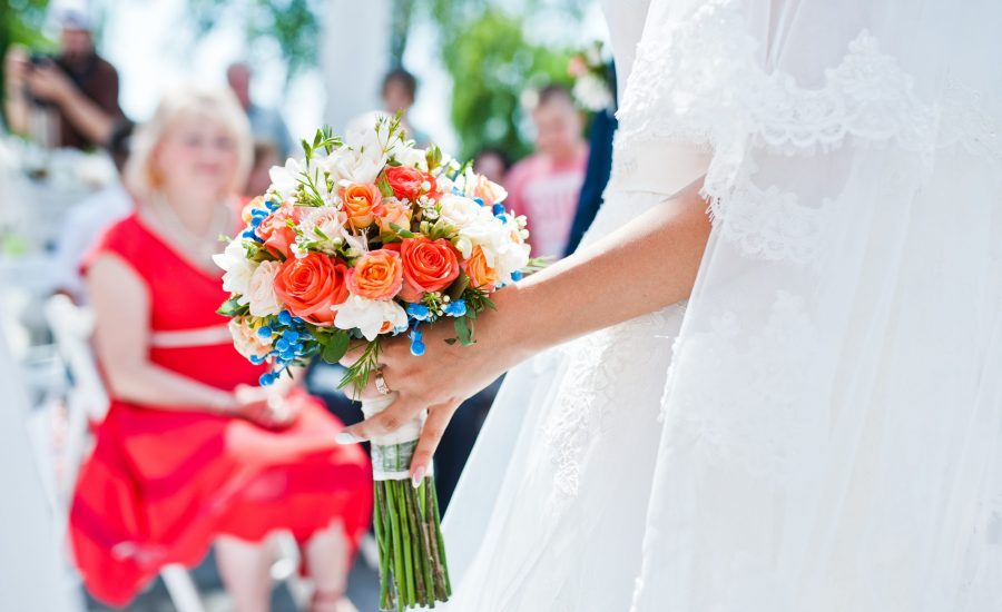 wedding bouquet at hand of bride