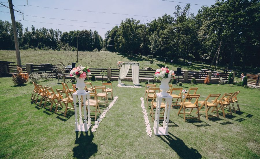 Beautiful wedding decorations for the ceremony outside in sunny weather